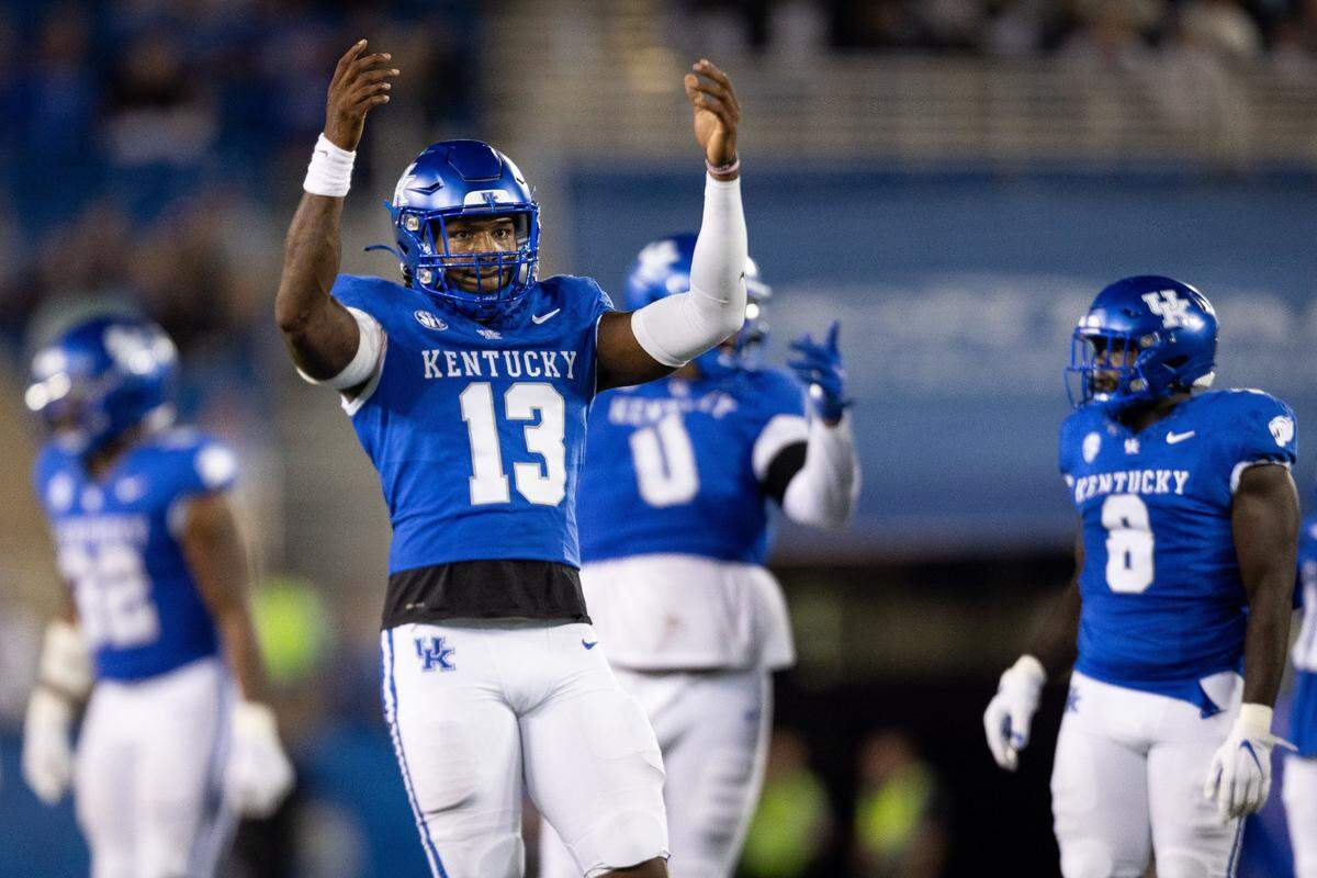 Kentucky redshirt senior rush end/outside linebacker J.J. Weaver (13), a graduate of Moore High School in Louisville, will play what is expected to be his final collegiate regular-season game on Saturday in his hometown when UK visits No. 9 U of L.