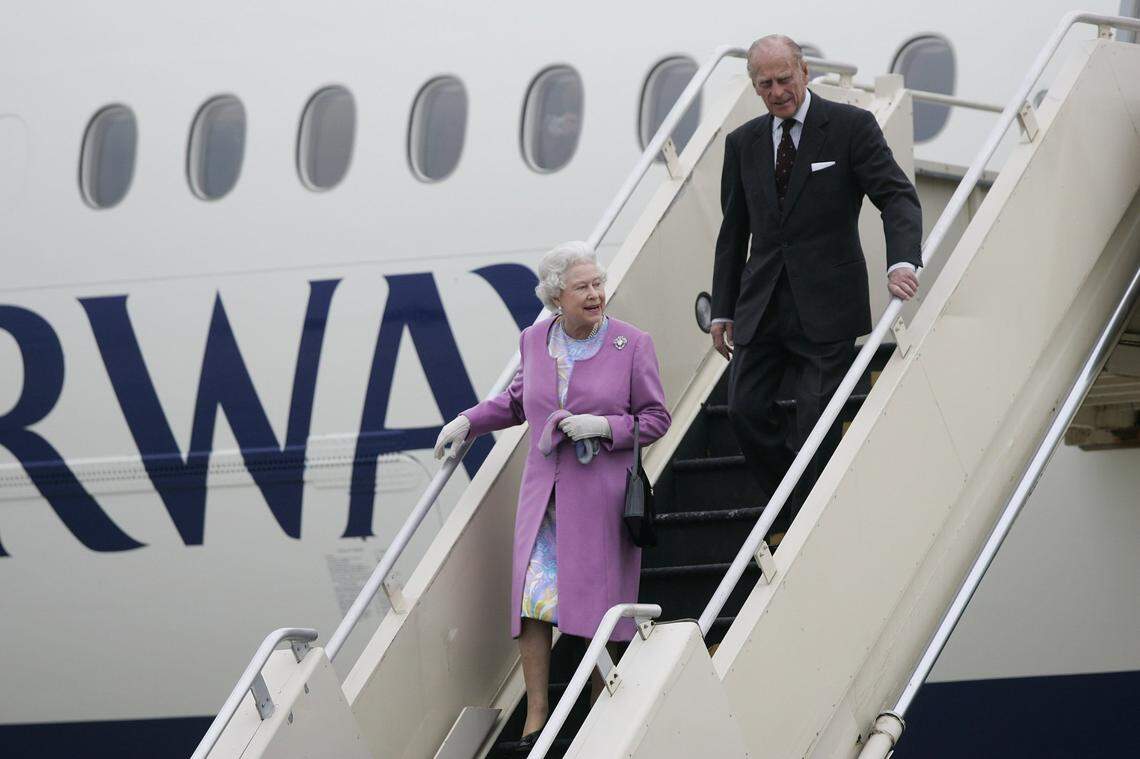 Queen Elizabeth II and Prince Philip walked down the stairs they arrived at the Blue Grass Airport in Lexington, Ky., Friday, May 04, 2007. The royal family is in Kentucky to watch the Kentucky Derby. Photo by Charles Bertram | Staff 3016
