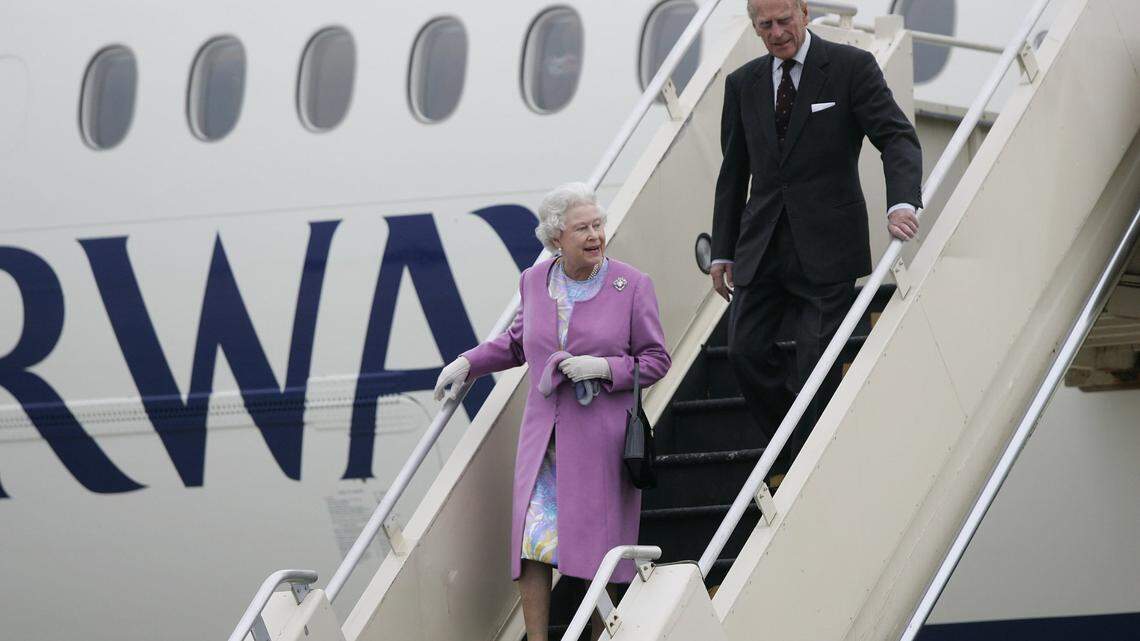Queen Elizabeth II and Prince Philip walked down the stairs they arrived at the Blue Grass Airport in Lexington, Ky., Friday, May 04, 2007. The royal family is in Kentucky to watch the Kentucky Derby. Photo by Charles Bertram | Staff 3016