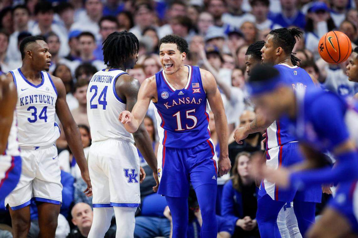 Kansas guard Kevin McCullar Jr. (15) celebrates near Kentucky’s Oscar Tshiebwe (34) and Chris Livingston (24) on Saturday, Jan. 28, 2023, at Rupp Arena.