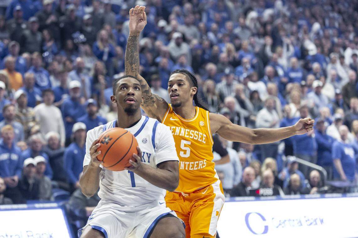 Kentucky basketball guard Lamont Butler (1) shoots the ball as Tennessee guard Zakai Zeigler (5) defends during a game at Rupp Arena in Lexington, Ky., on Tuesday, Feb. 11, 2025. Kentucky has already beaten Tennessee twice this season.
