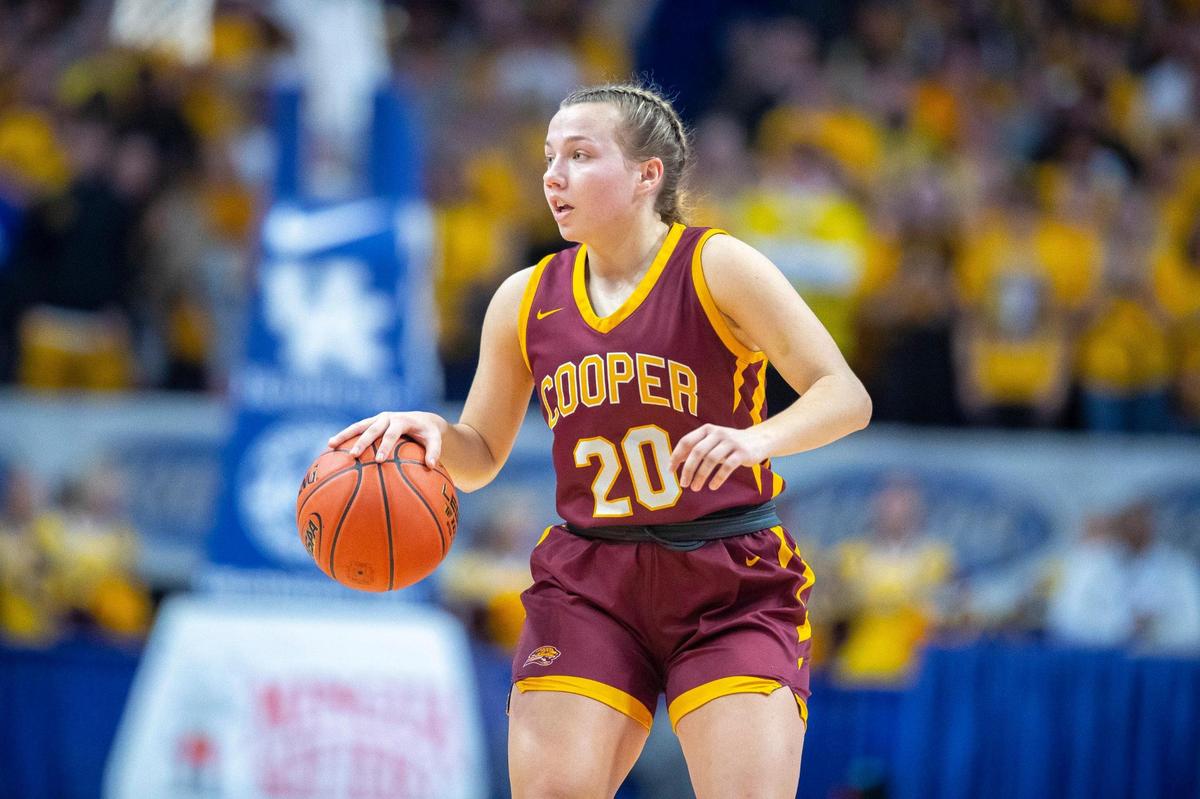 Cooper’s Kay Freihofer (20) frequently leads the Jaguars in rebounding. “She’s tough as nails,” head coach Justin Holthaus said of Freihofer, the niece of former UK football coach John Schlarman.