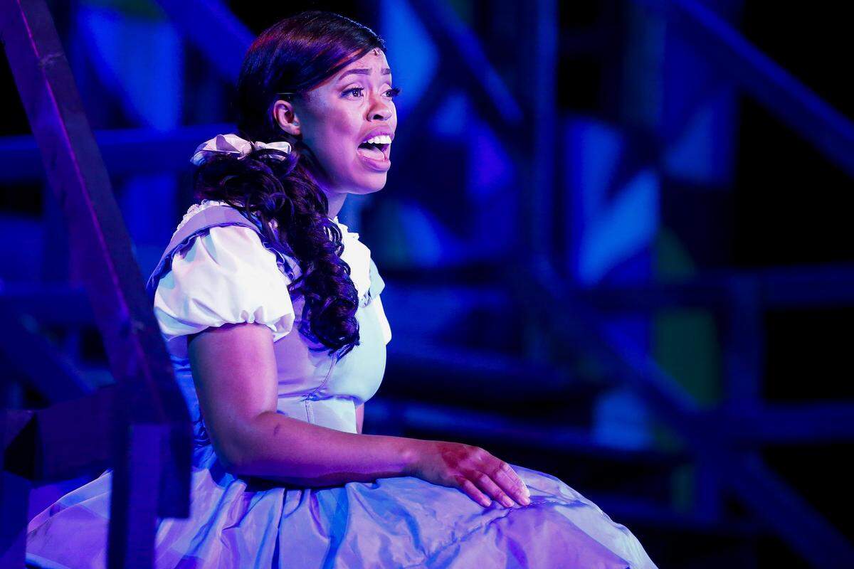 Krissalynn Love, playing Belle, performed during “Beauty and the Beast,” presented by the Kentucky Conservatory Theatre for Summerfest 2018 Friday at Woodland Park in Lexington. Performances being at 8:45 p.m. Thursday through Sunday until July 22. Tickets being at $11 for children at $16 for adults.