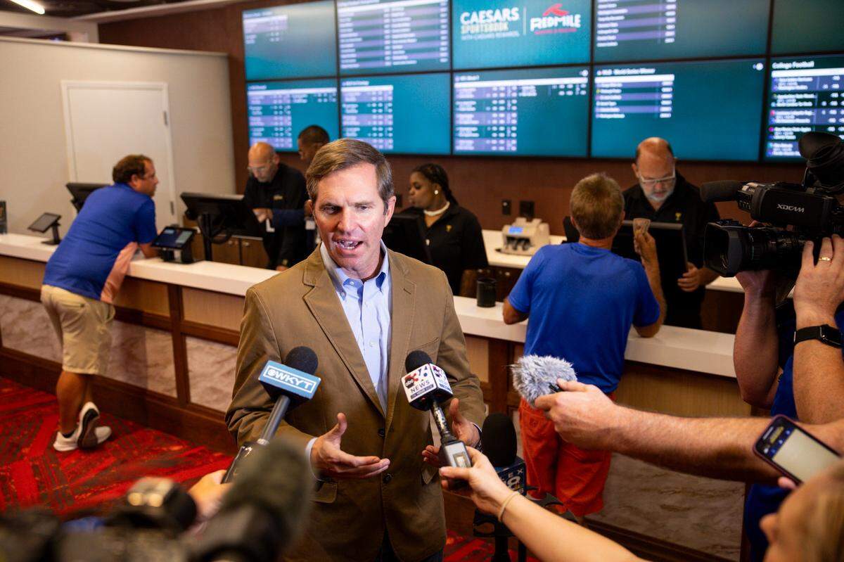 Gov. Andy Beshear announces the opening of a Caesars Sportsbook and comments on the first day of sports betting legalization in the commonwealth at the Red Mile in Lexington in September.