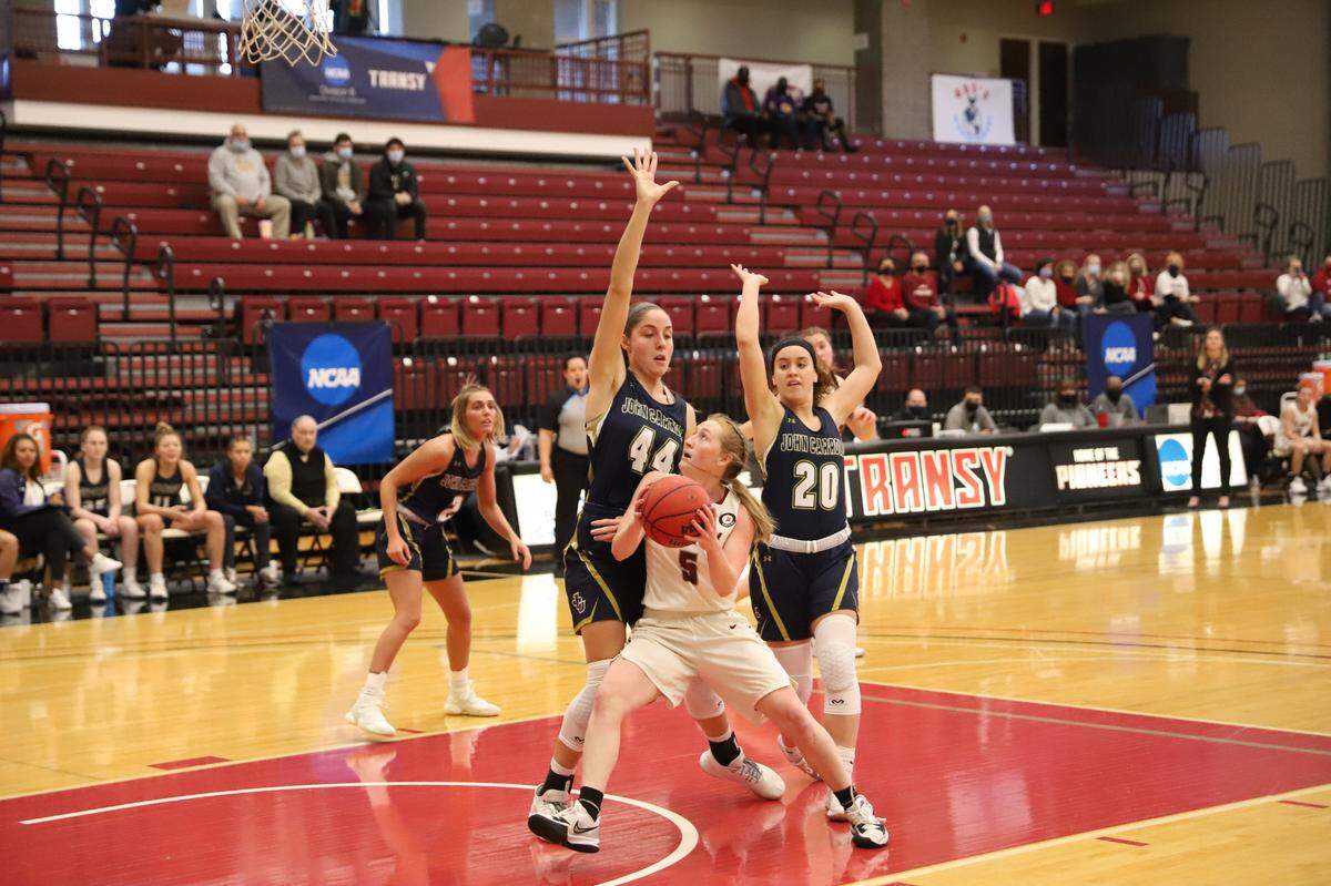 Transylvania junior Madison Kellione tries to shoot the ball against John Carroll on Dec. 20 in a home game for Transy at the Clive M. Beck Center. Kellione, who went to high school at Harrison County, is Transy’s leading scorer this season.