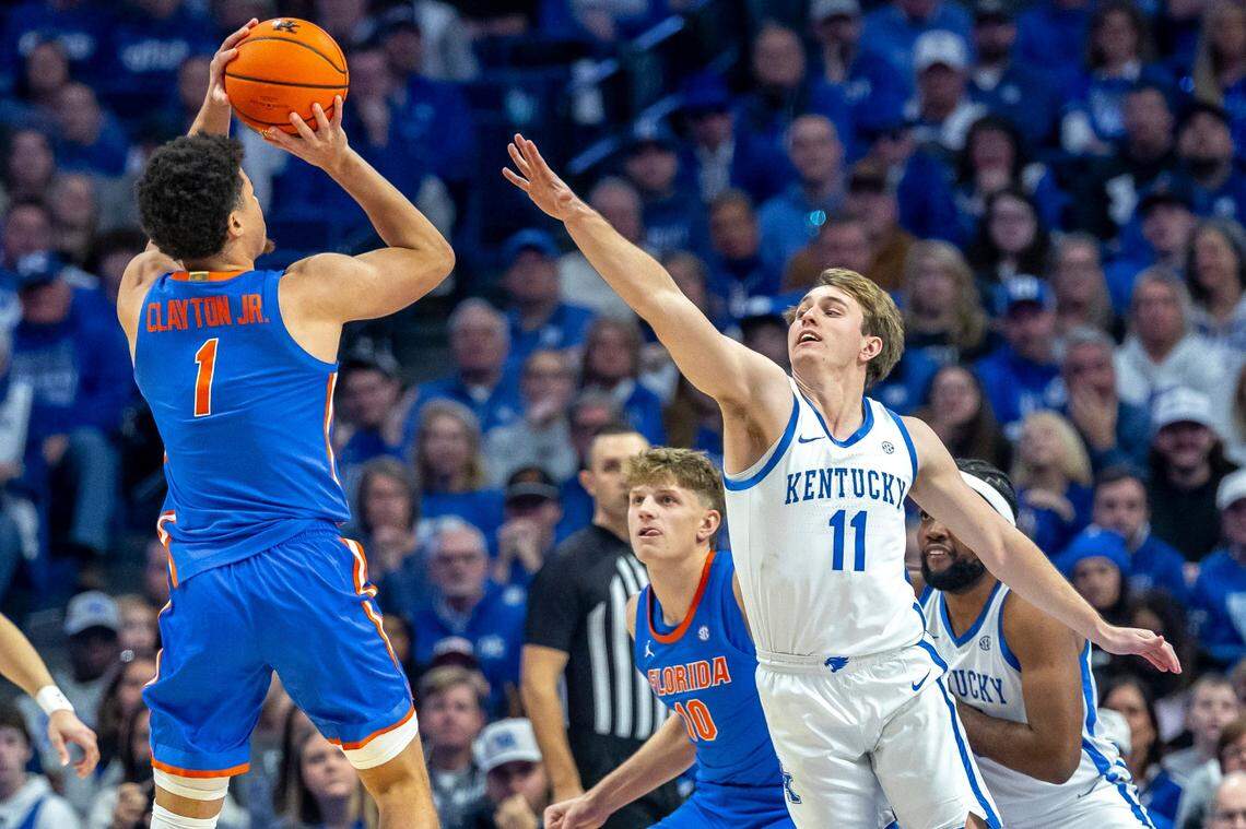 Florida guard Walter Clayton Jr. (1) shoots the ball as Kentucky guard Travis Perry (11) defends during a game at Rupp Arena on Jan. 4.