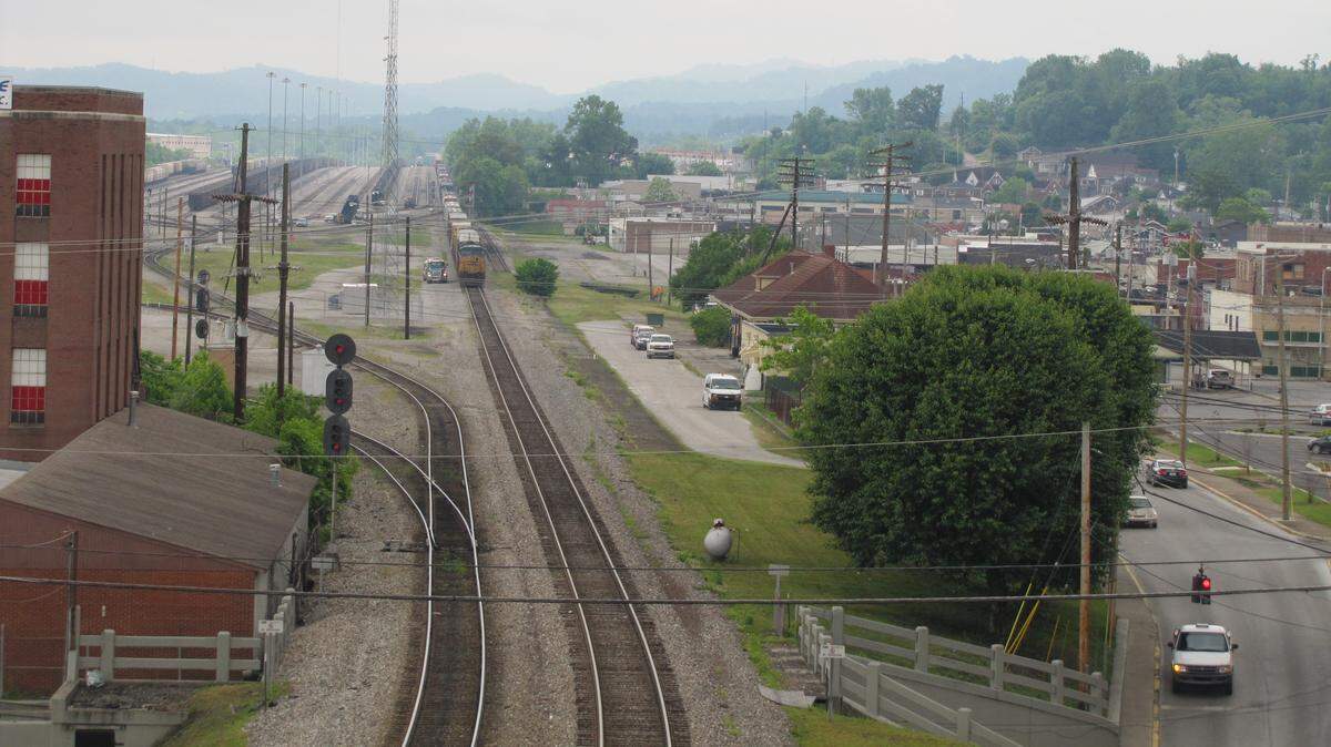 Train tracks run through downtown Corbin, which grew up around the railroad. The old Louisville & Nashville depot is  at center right.  