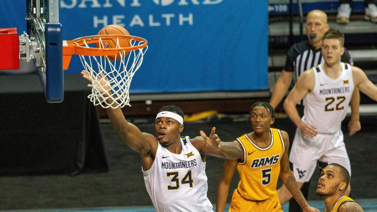 Oscar Tshiebwe averaged 11.2 points and 9.3 rebounds in 23.3 minutes per game as a freshman last season.