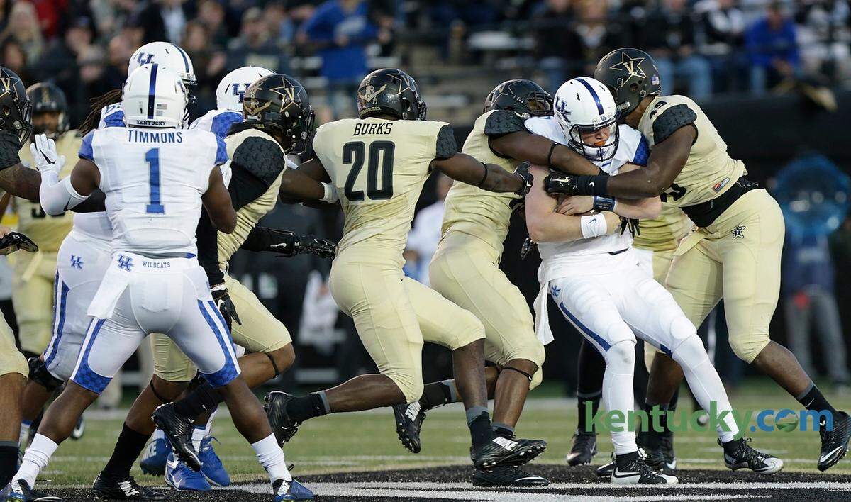Kentucky quarterback Drew Barker was sacked during UK’s 21-17 loss at Vanderbilt in 2015.