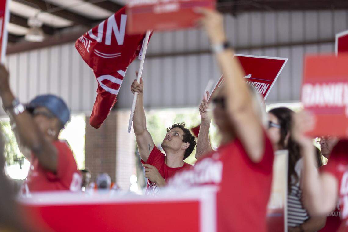 Daniel Cameron supporters cheer as the former Kentucky Attorney General and U.S. Senate candidate delivers a speech at the 145th annual St. Jerome Fancy Farm Picnic in Fancy Farm, Ky., on Saturday, Aug. 2, 2025.