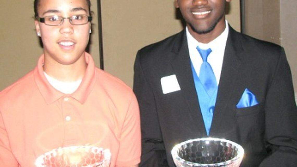 Makayla Epps of Marion County and Dominique Hawkins of Madison Central were named Miss and Mr. Basketball on Friday night. (Mike Fields photo)