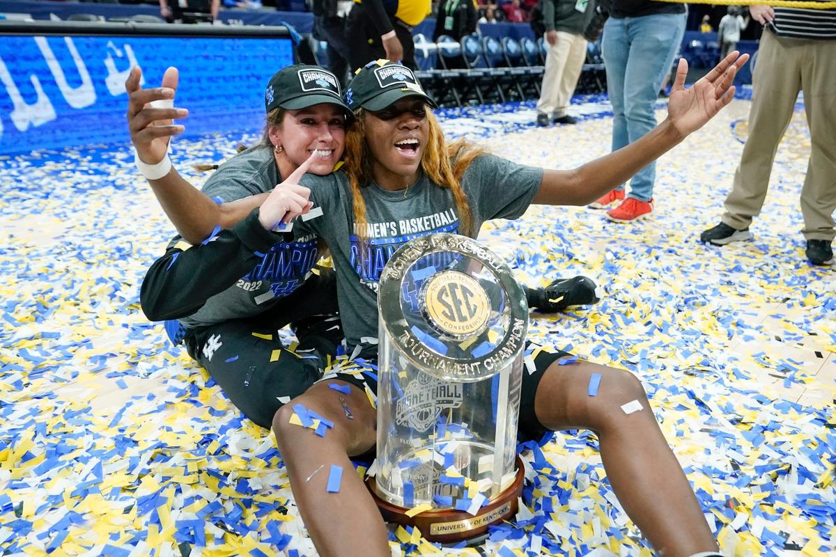 Kentucky’s Rhyne Howard, right, and Blair Green celebrate after Kentucky beat South Carolina to win the NCAA women’s college basketball Southeastern Conference tournament championship game Sunday, March 6, 2022, in Nashville, Tenn. (AP Photo/Mark Humphrey)