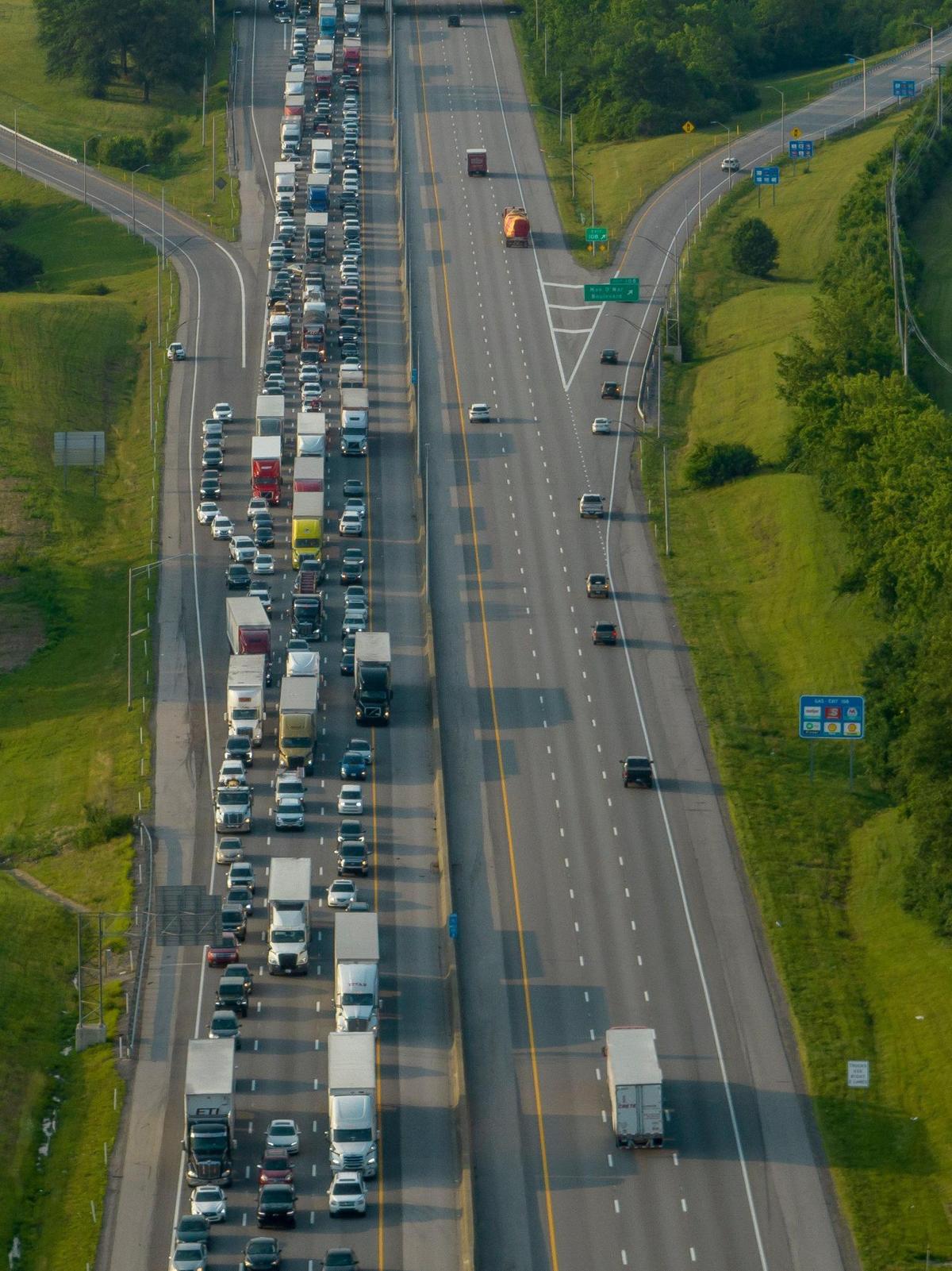Traffic is backed up on the northbound side of I-75 before the Winchester exit in Lexington, Ky., on Tuesday, June 13, 2023.