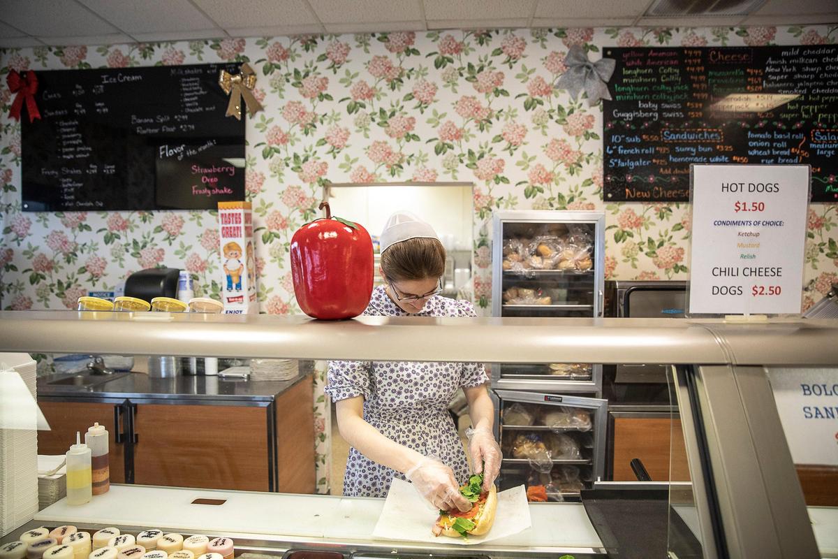 Angela Gerber makes a sub at Walnut Leaf Country Market at 4004 Camargo Rd. in Camargo, Ky., on Tuesday, Feb. 18, 2020.