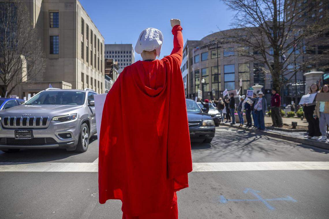 People attend a rally during a No Kings protest in downtown Lexington, Ky., on Saturday, March 28, 2026.
