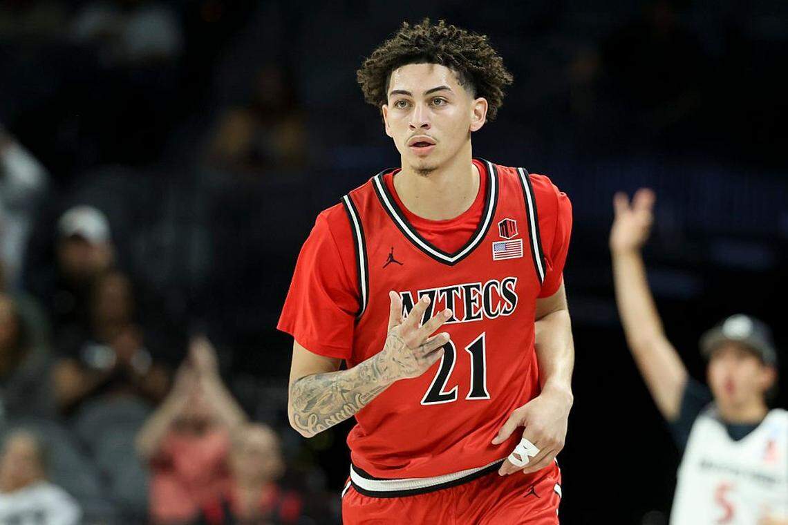 LAS VEGAS, NEVADA - NOVEMBER 25: Miles Byrd #21 of the San Diego State Aztecs reacts after making a 3-point basket against the Oregon Ducks during the first half of a Players Era Championship basketball tournament game at Michelob ULTRA Arena on November 25, 2025 in Las Vegas, Nevada.  (Photo by Ian Maule/Getty Images)
