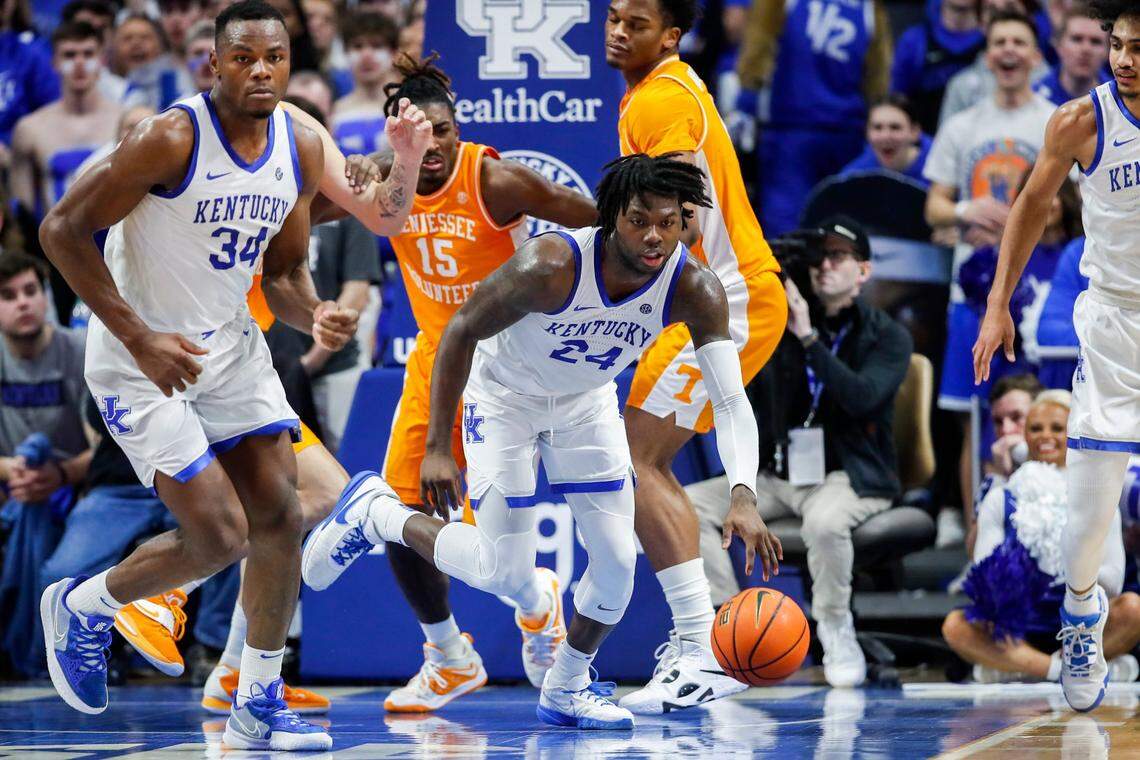 Kentucky forward Chris Livingston (24) dribbles the ball up the court after getting a rebound against Tennessee during Saturday’s game at Rupp Arena.