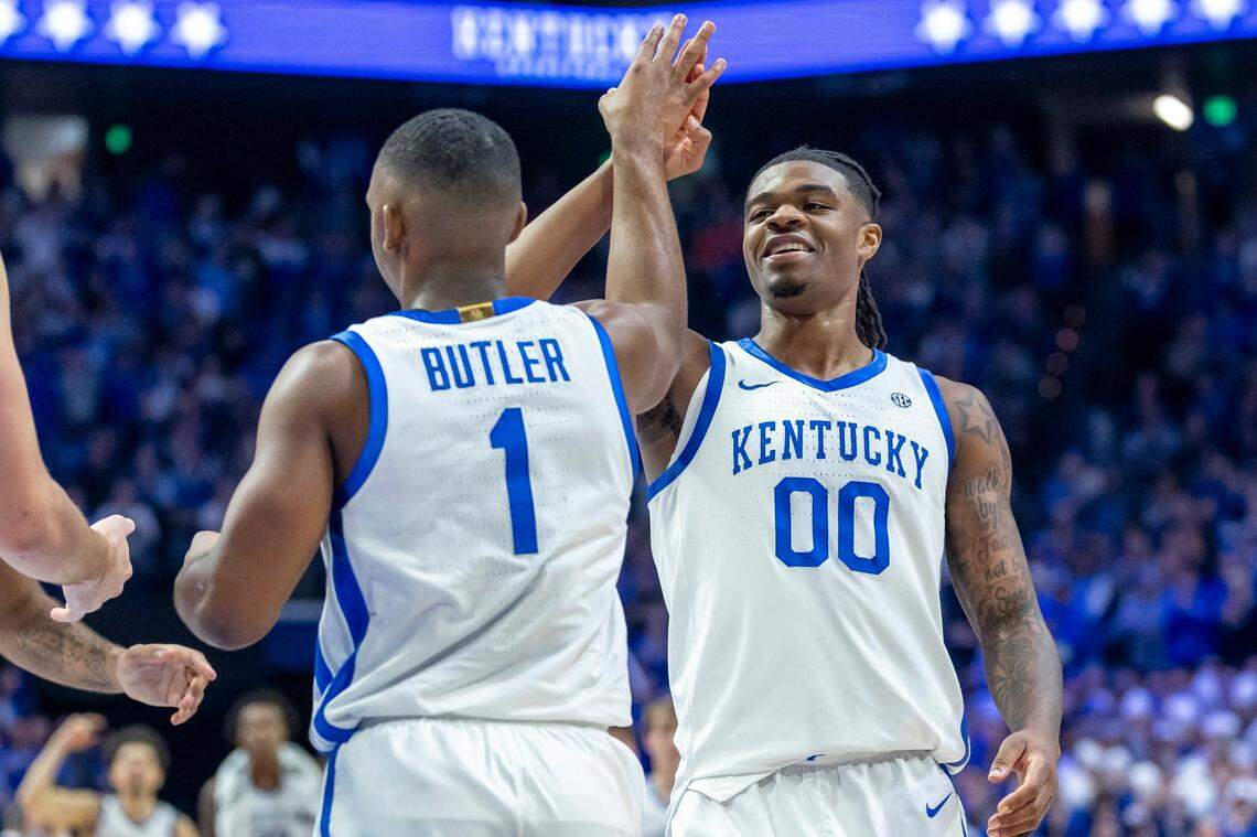 Kentucky guards Otega Oweh (00) and Lamont Butler (1) celebrate during Saturday’s win against Florida at Rupp Arena.