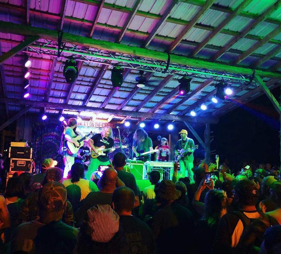 Tyler Childers, left, performs at Kickin’ It on the Creek on Sept. 15, 2018. The music star has played at each festival on the Roberts’ land.