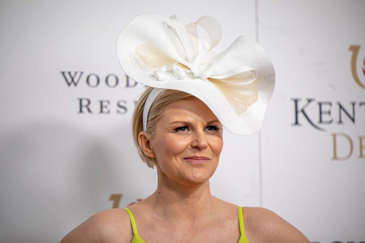 Actress Jennifer Robertson, known for her known for her starring role as Jocelyn Schitt on the Emmy Award-winning sitcom, “Schitt’s Creek,” walks the red carpet at Churchill Downs in Louisville, Ky., Saturday, May 7, 2022.