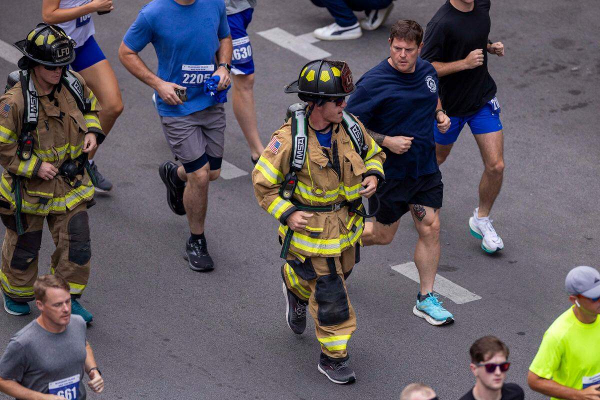 A group of Lexington firefighters were among the participants in Thursday’s Bluegrass 10,000 in Lexington.