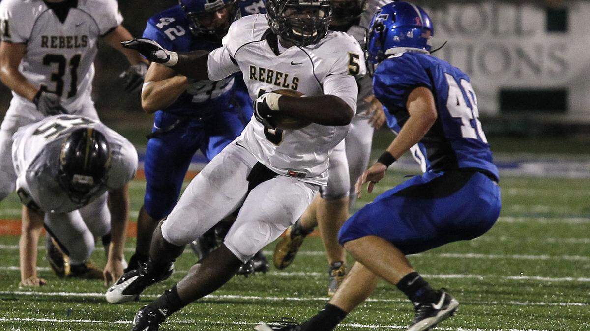 Boyle County's Lamar Dawson, who excelled at linebacker but also played running back and tight end, was selected the Player of the Year by members of The Associated Press.  