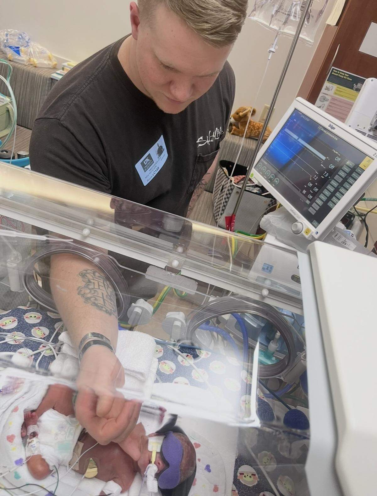 Chris Jones visited his son Colsen in the neonatal intensive care unit at Golisano Children’s at the University of Kentucky.