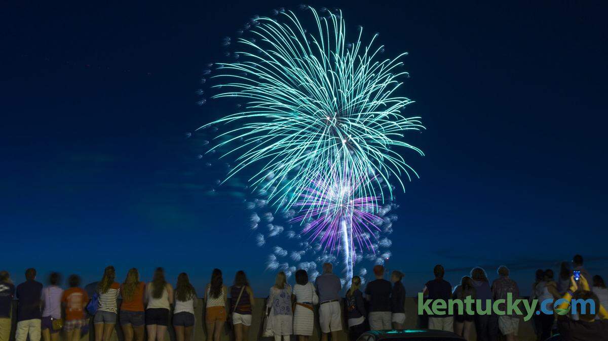A crowd gathered on the top floor of a parking structure on Broadway near High street to watch the downtown fireworks presented by Thorntons on July  4, 2014 in Lexington, Ky.  Photo by Mark Mahan