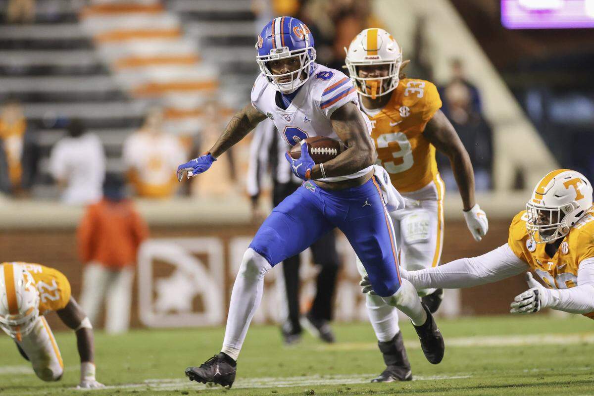 Florida wide receiver Trevon Grimes (8) ran with the ball during the Gators’ 31-19 win over Tennessee at Neyland Stadium last year. It was UF’s 15th win in its last 16 games versus UT.