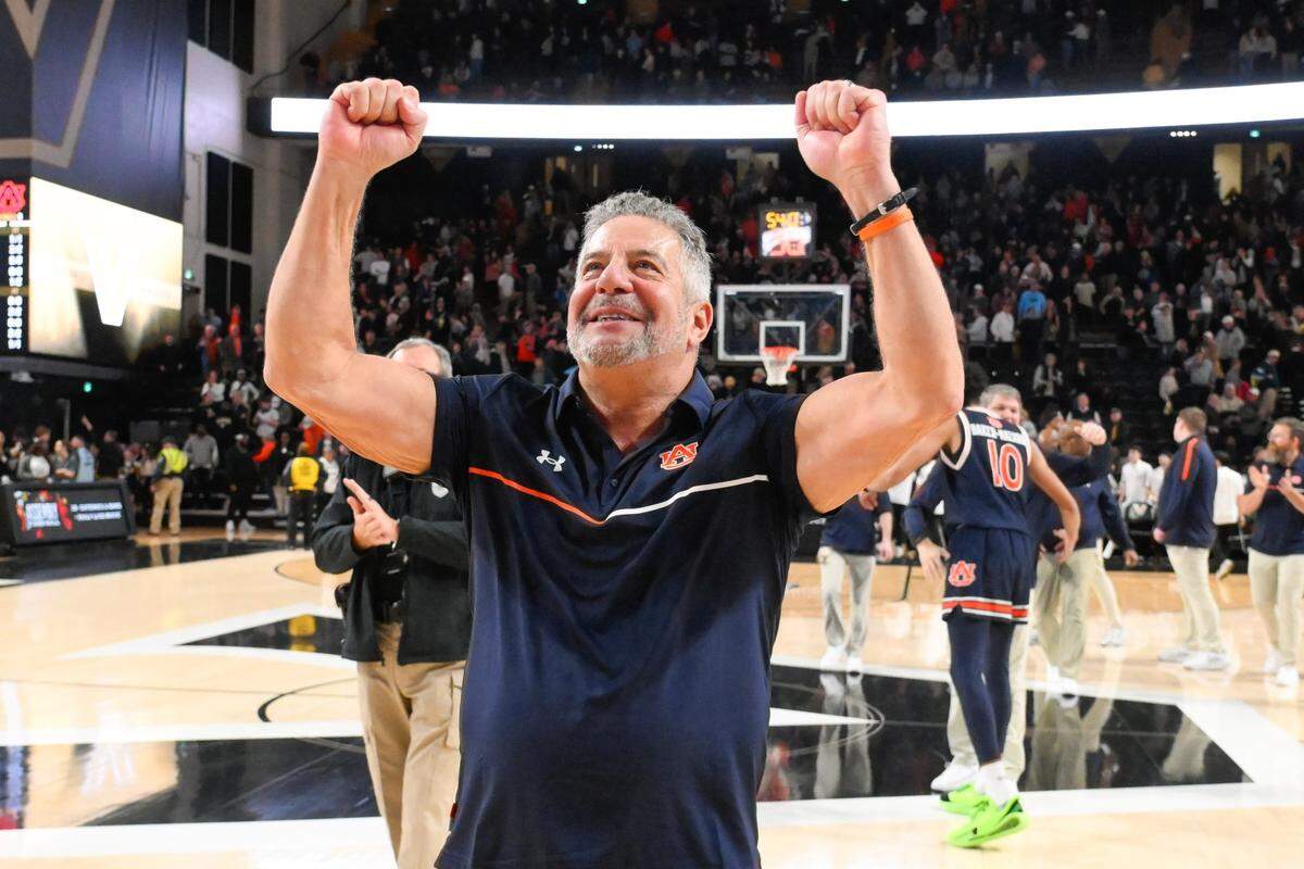 Feb 11, 2025; Nashville, Tennessee, USA; Auburn Tigers head coach Bruce Pearl waves to the crowd after the game against the Vanderbilt Commodores at Memorial Gymnasium. Mandatory Credit: Steve Roberts-Imagn Images