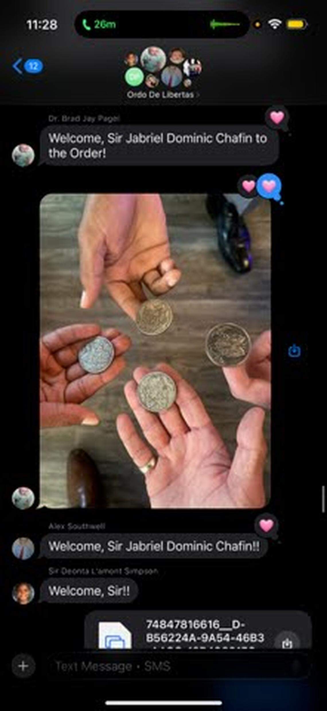 In a group message to “Ordo de Libertas” members obtained by the Herald-Leader, “Dr.” Brad Pagel texted a welcome to a new member as he and other Lexington Blue employees showed their coins.