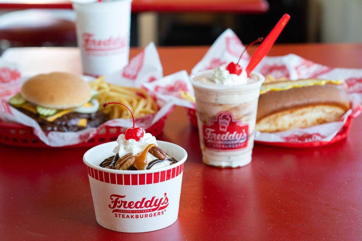 The menu at Freddy’s includes steakburgers, beef hot dogs, custard shakes and the signature turtle sundae concretes.