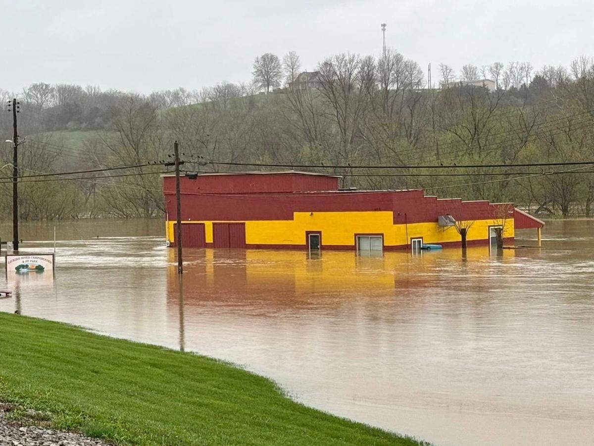 Floodwaters continued to rise Sunday, April 6, 2025 in Falmouth. Pendleton County officials issued emergency evacuation orders for Falmouth and Butler on Saturday, and access to much of Falmouth and all of Butler was cut off Sunday.