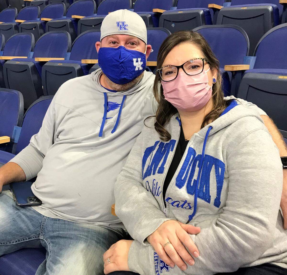 University of Kentucky basketball fans J.D. and Jessica Hall traveled from Ohio for last week’s Blue-White Game in Rupp Arena. “I’m fine with it,” J.D. said of UK’s mask policy. “Whatever it takes to have a full arena again.”
