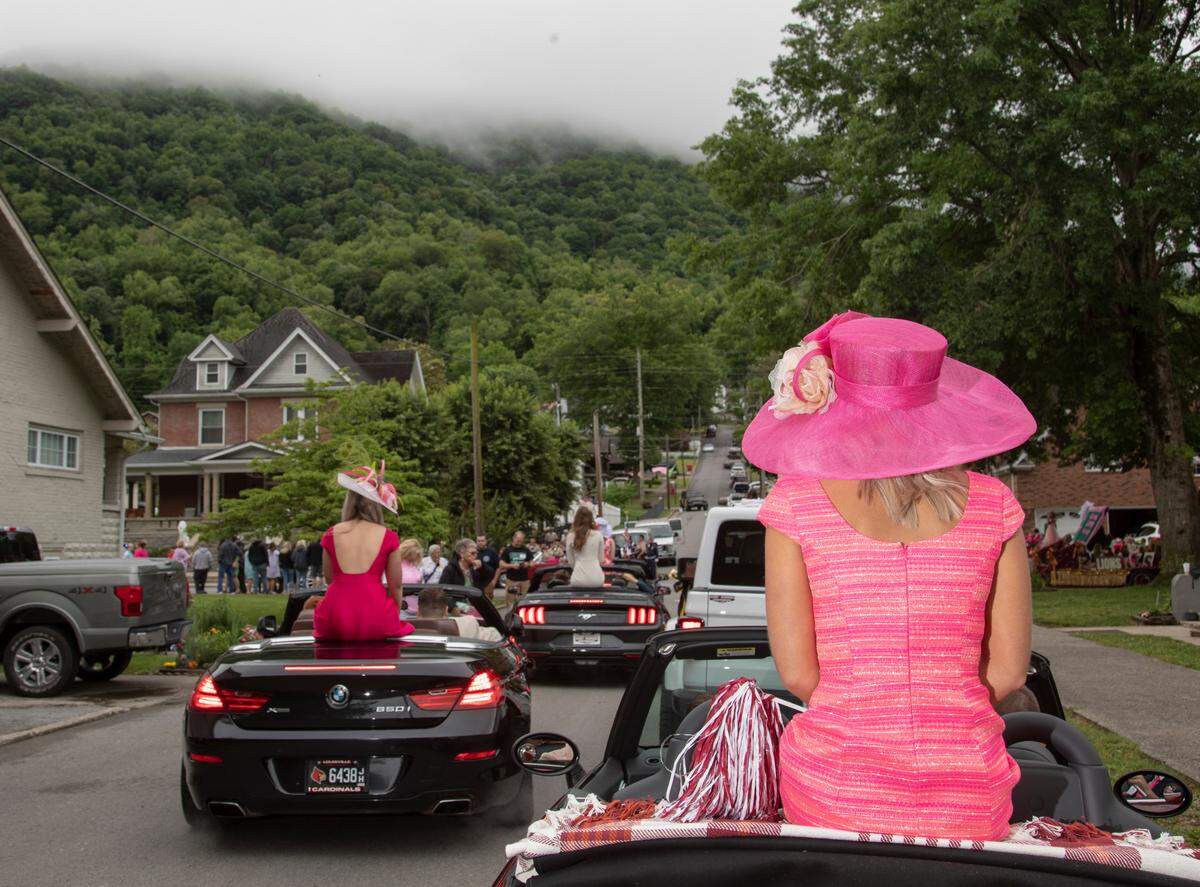 Queen candidates prepare for the parade to head into downtown during the 90th annual Kentucky Mountain Laurel Festival Saturday in Pineville. There were 18 candidates from various universities across the state.