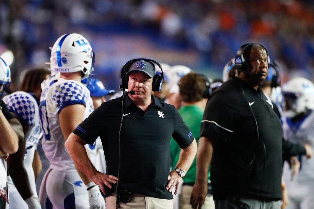 Mark Stoops watched his team during No. 20 Kentucky’s 26-16 upset of No. 12 Florida on Saturday night in Gainesville.