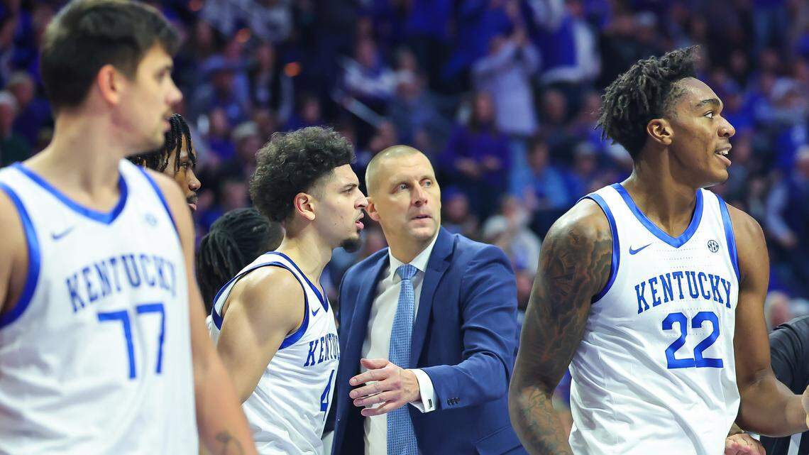 Mark Pope runs onto court to play peacemaker during Kentucky-Georgia State scrum