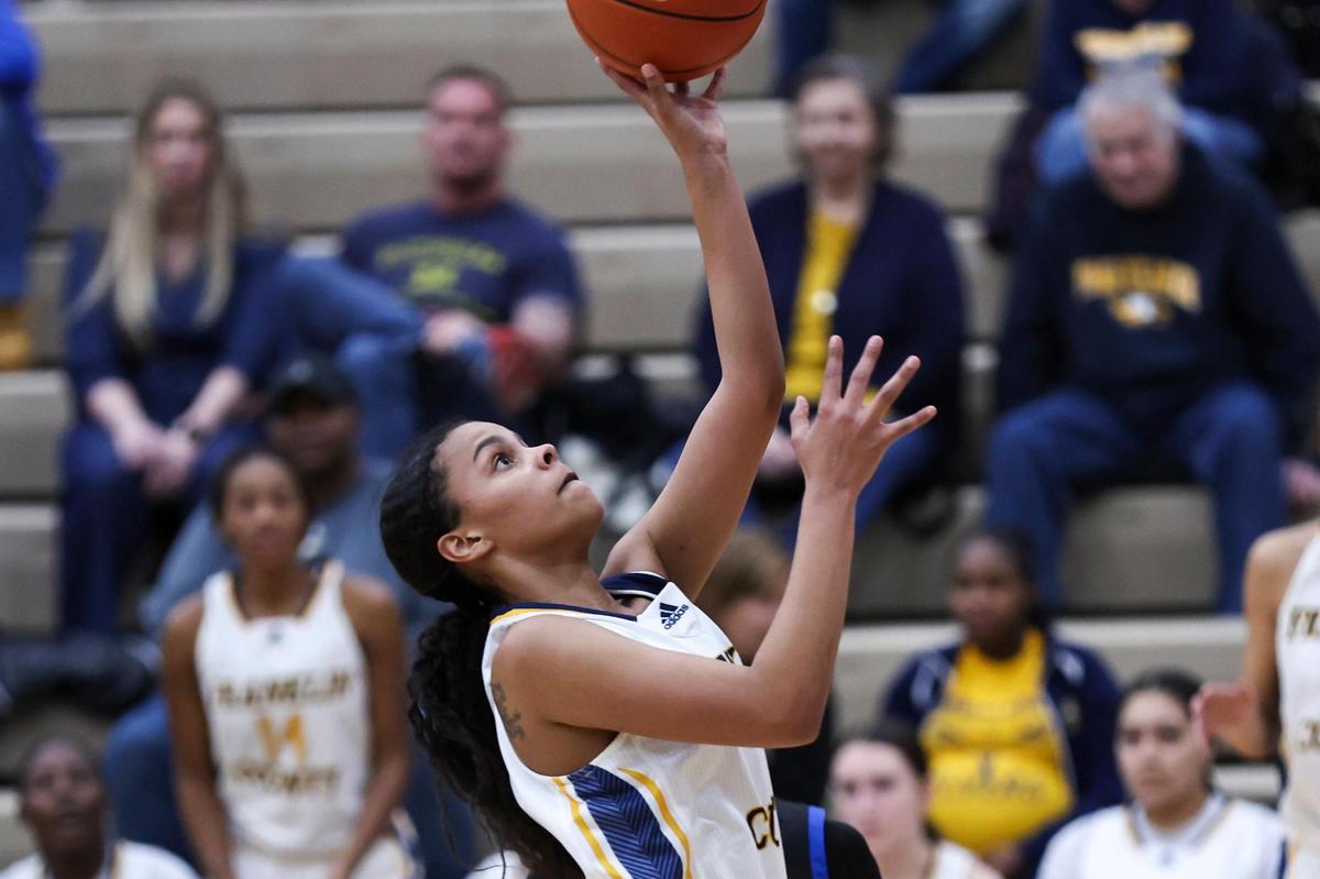Madison Jackson (4) scored 15 points for Franklin County in its semifinal win Thursday night over Henry Clay.