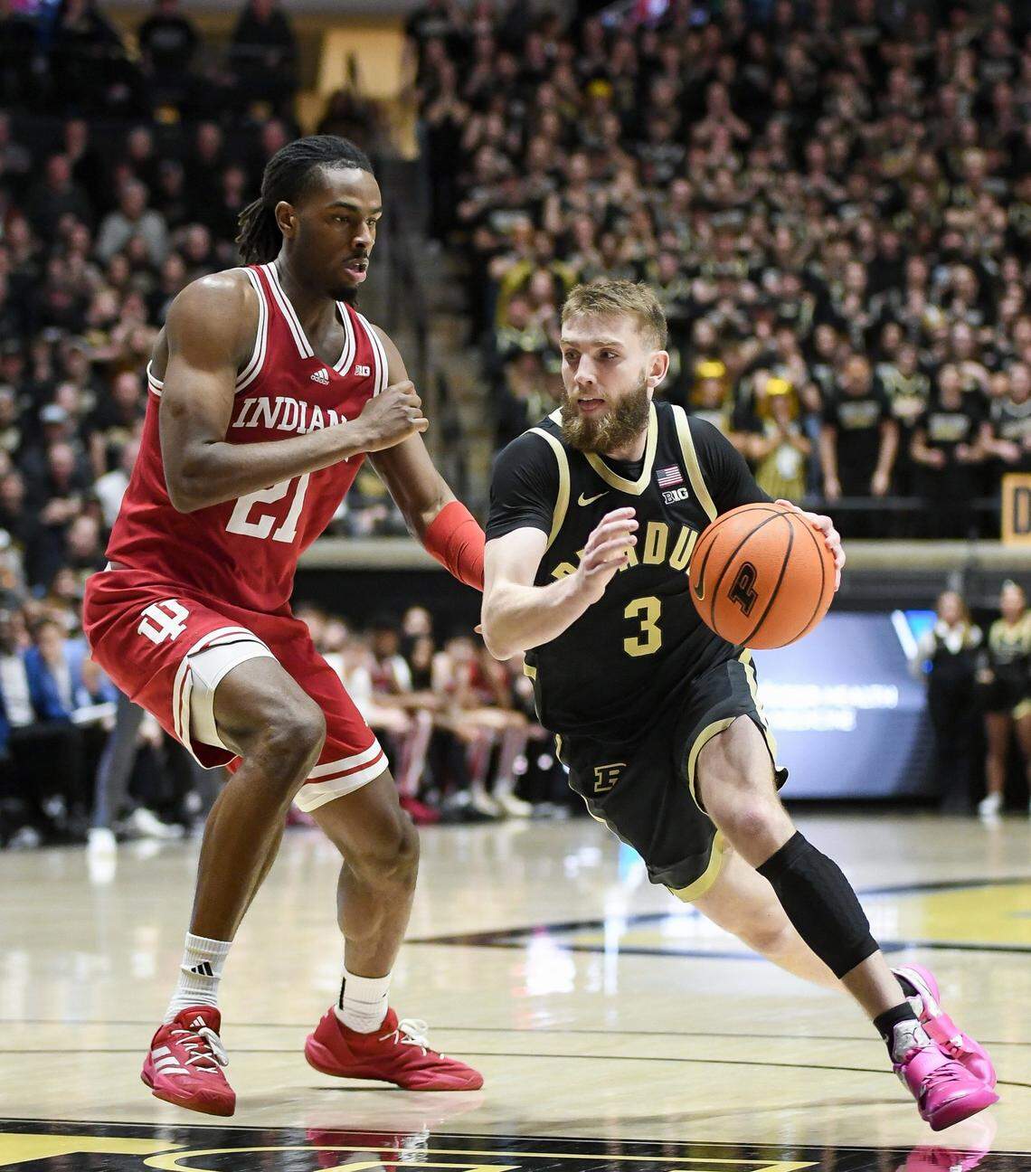 Indiana forward Mackenzie Mgbako defends Purdue point guard Braden Smith during a game this season.