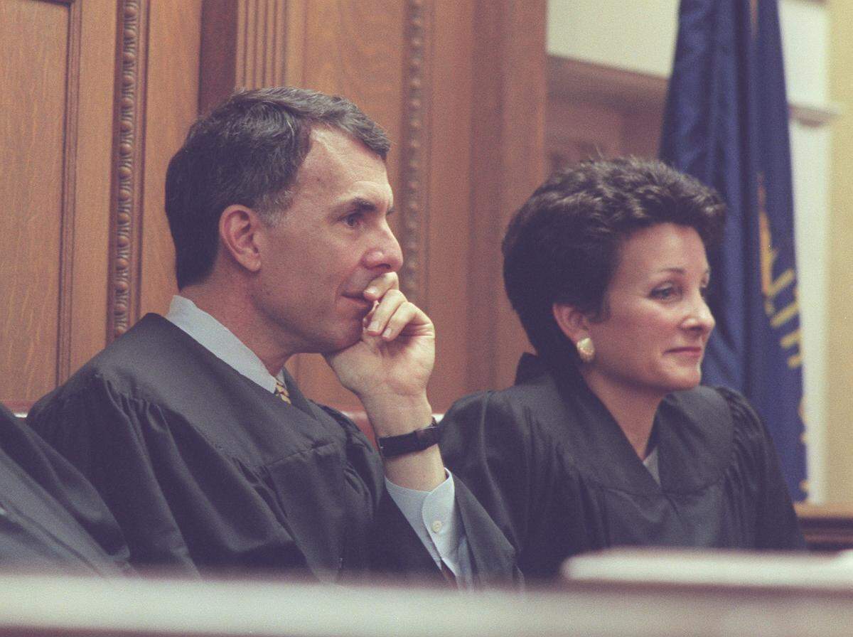 On Aug. 14, l997, Fayette Circuit Court holds its first Drug Court graduation at the Fayette County Courthouse in Lexington, Ky. Drug Court participants agree to adhere to strict rehabilitation guidelines. In this photo, Circuit Judges Lewis Paisley, left, and Sheila Isaac preside over Drug Court, as does Judge Mary Noble (not pictured). 