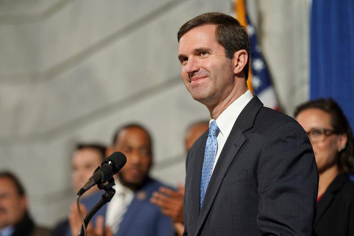 Kentucky Governor Andy Beshear, a Democrat, speaks at a press conference before signing an executive order to reinstate the voting rights of over 100,000 non-violent felons who have completed their sentences, at the Capitol in Frankfort, Ky., Thursday, Dec. 12, 2019.