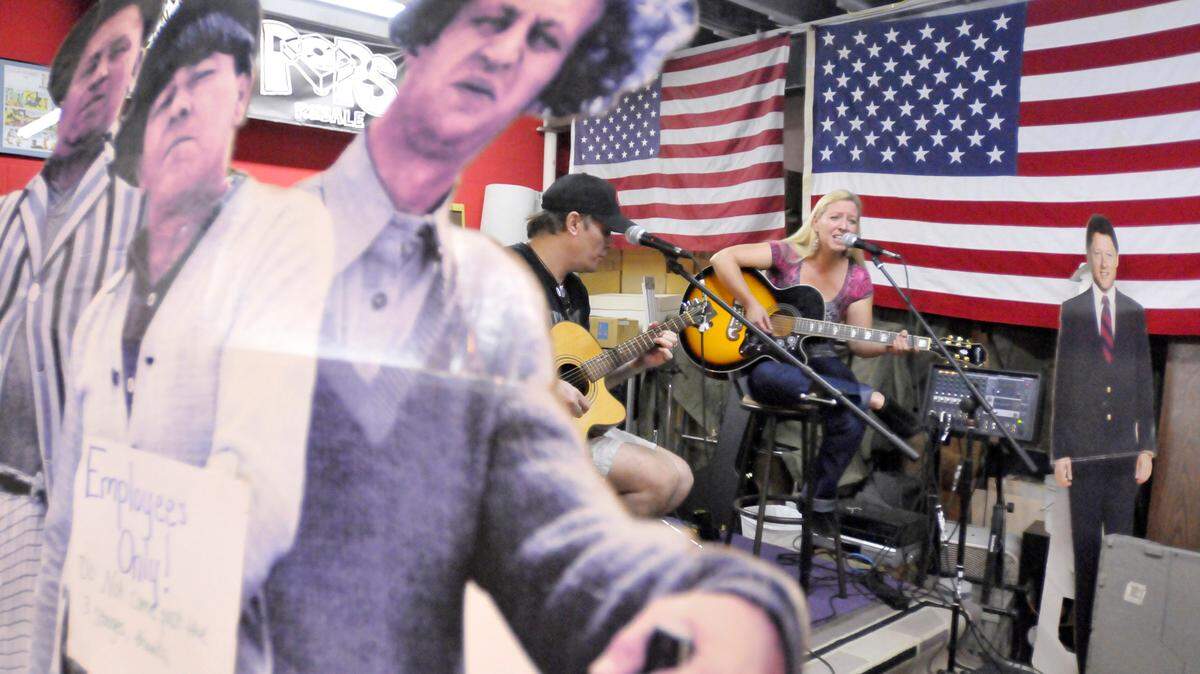 Chris Currens and Rebecca White perform a mid-afternoon set at Pop's Resale on March 12, 2011. For several years, Pops Resale at 1423 Leestown Road in Lexington, Ky., has featured bands and, more recently, poetry readings on Saturday afternoons.  Photo by Rich Copley | Lexington Herald-Leader