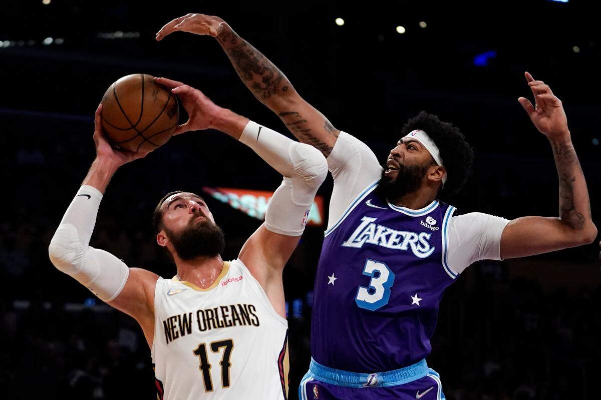 Los Angeles Lakers forward Anthony Davis (3) defends against New Orleans Pelicans center Jonas Valanciunas (17) on April 1. Davis was limited by injuries to 40 games and L.A. missed the playoffs.