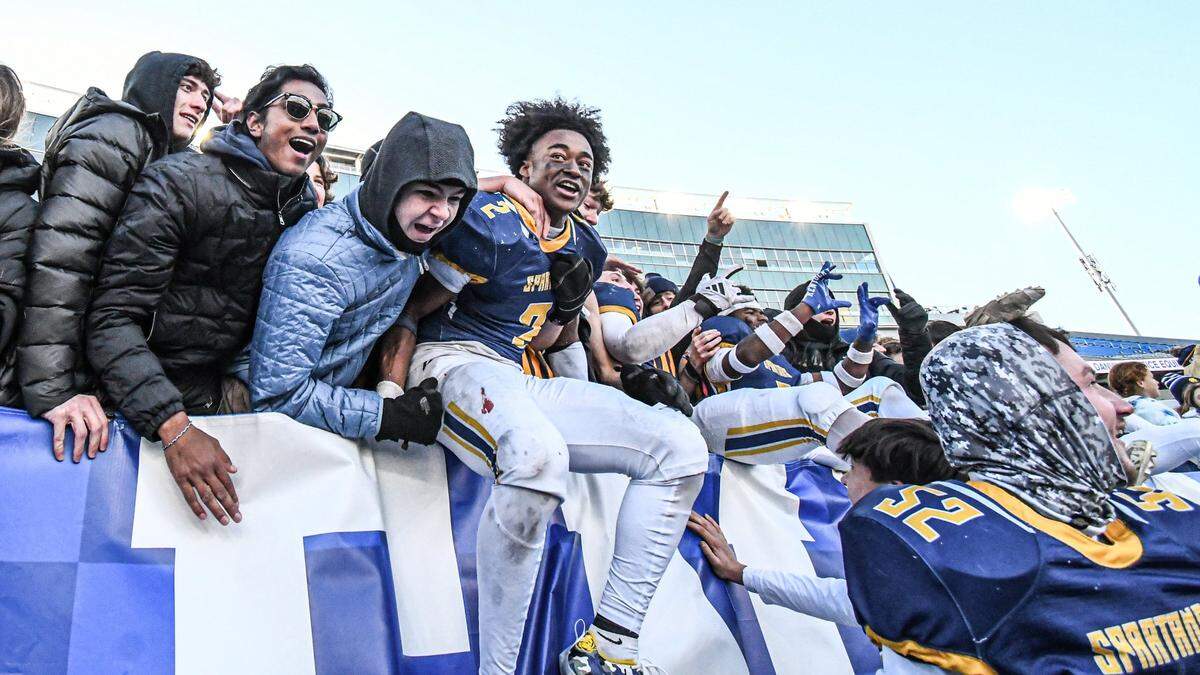 Sayre’s Brock Coffman celebrated the school’s first KHSAA state title with his fellow classmates at the 2024 Class A State Football Finals in Lexington.
