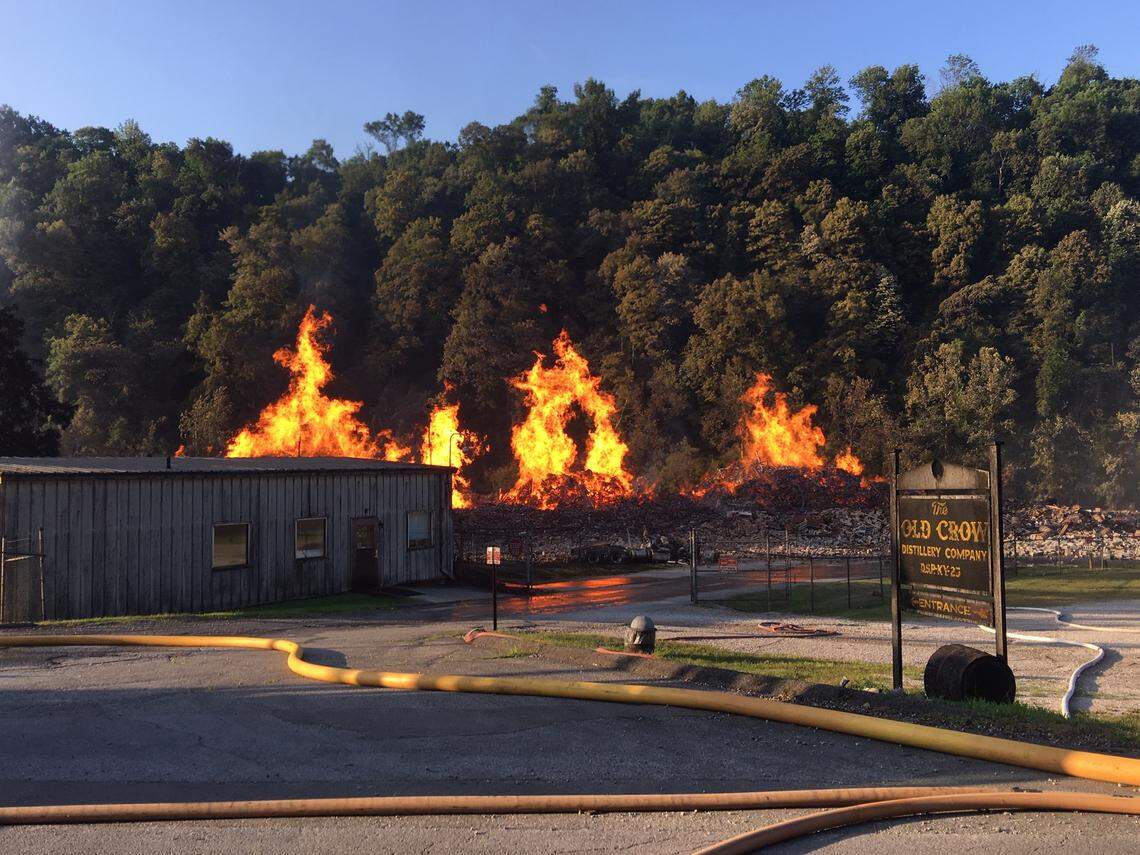 More than eight hours after the fire began, flames were still visible from a Jim Beam warehouse in Woodford County. Crews from four counties were working to put out the flames.