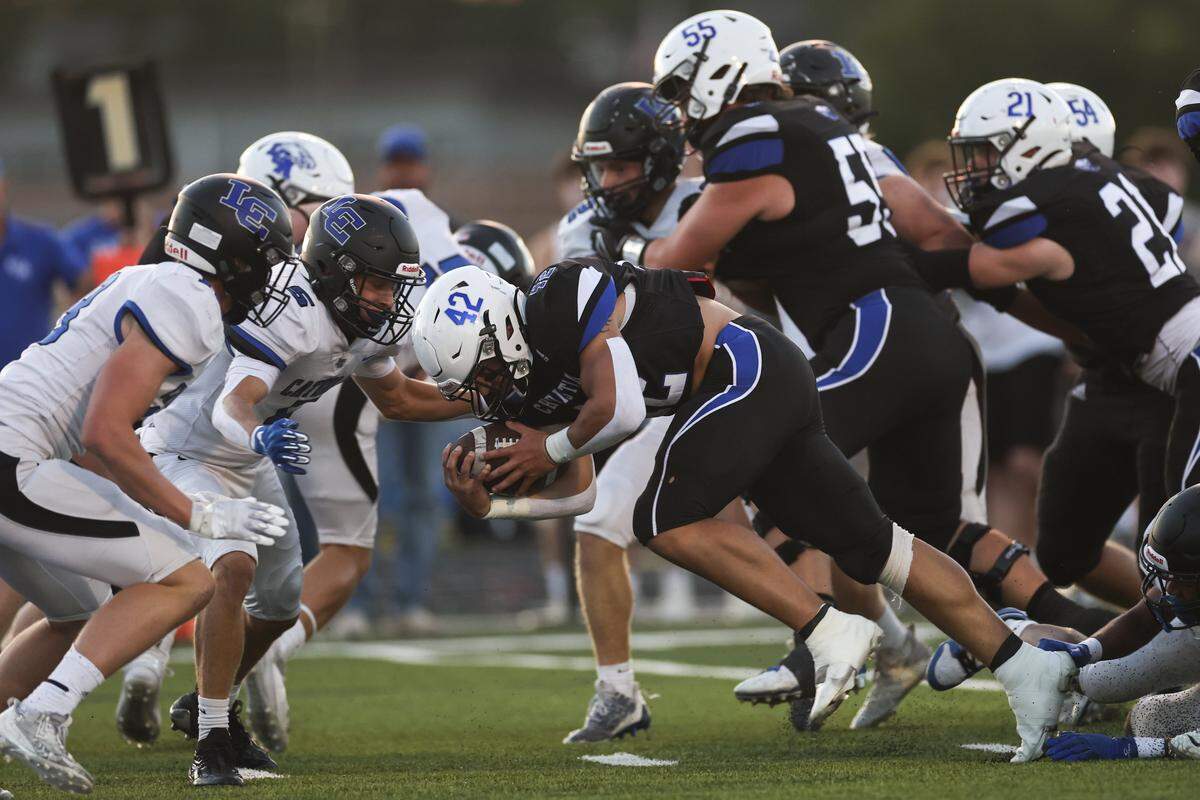 LCA’s Brady Hensley (42) rushes for a touchdown against Lexington Catholic in the Eagles’ 49-42 home victory during the 2023 season.