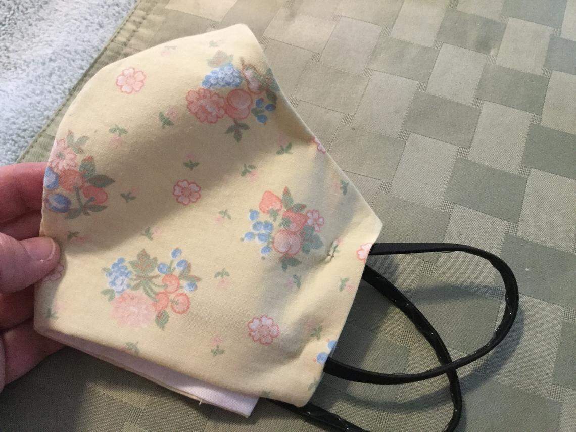 Almost done. I had to adjust the earpieces to get a snug fit. One nurse who makes masks recommends sewing the sides a little in from the edge to help prevent a gap on the side of your face.