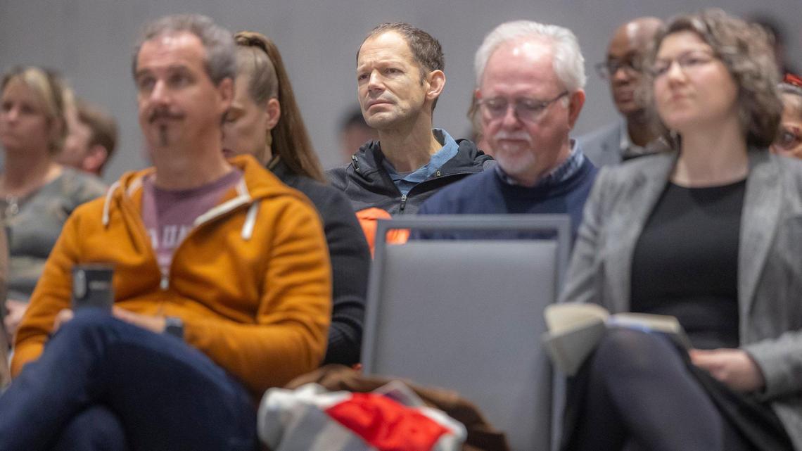 Attendees listen to a presentation during a University of Kentucky Board of Trustees meeting at the Gatton Student Center on the UK campus in Lexington, Ky., on Friday, Feb. 23, 2024.