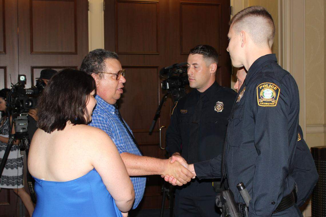 Mark Buede and his daughter, Faith Buede, met three officers from the Lexington Police Department who worked a child abuse case that the Buedes helped them uncover.