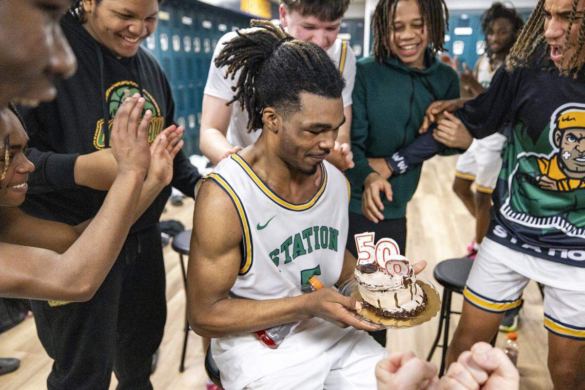 Bryan Station's Amari Owens is honored with a cake after reaching 500 career rebounds after winning the boys 42 District Tournament Semifinal at Bryan Station High School in Lexington, Kentucky, on Wednesday, Feb. 25, 2026.